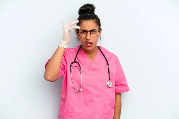 Hispanic Woman Feeling Confused Puzzled Showing You Insane Nurse Concept — Stock Photo, Image