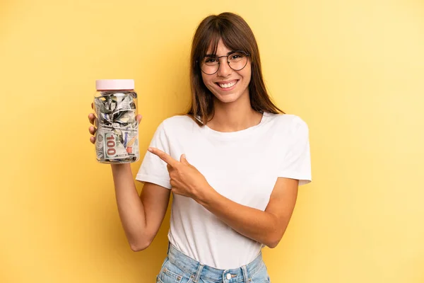 Hispanic Woman Smiling Cheerfully Feeling Happy Pointing Side Savings Concept — Stockfoto