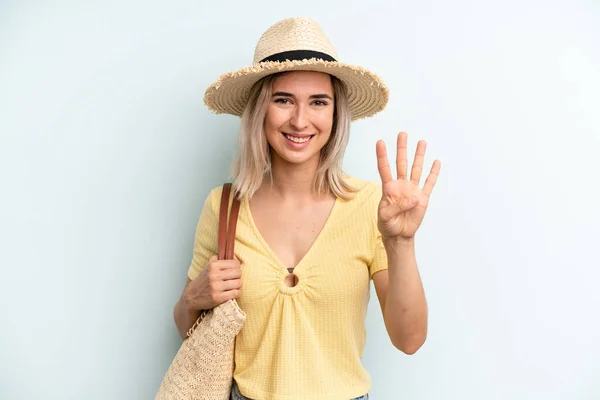 Blonde Woman Smiling Looking Friendly Showing Number Four Summer Concept — 图库照片