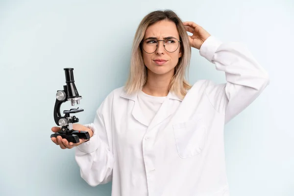 Blonde Woman Smiling Happily Daydreaming Doubting Scientist Student Concept — Stockfoto
