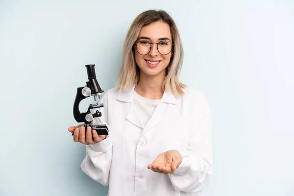 Blonde Woman Smiling Happily Friendly Offering Showing Concept Scientist Student — Stockfoto