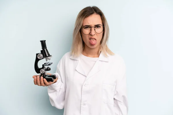 Blonde Woman Feeling Disgusted Irritated Tongue Out Scientist Student Concept — Stockfoto