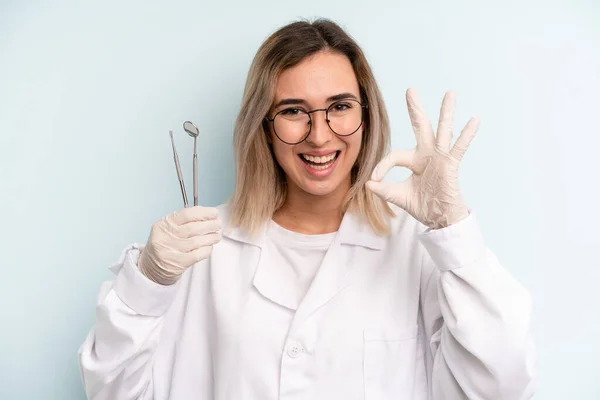 Blonde Woman Feeling Happy Showing Approval Okay Gesture Dentist Concept — Stockfoto