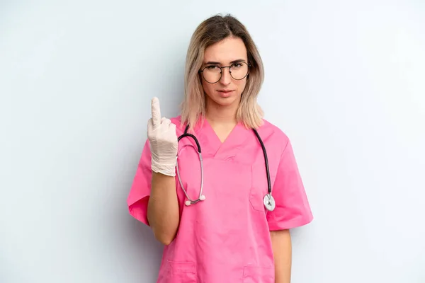 Blonde Woman Feeling Angry Annoyed Rebellious Aggressive Nurse Concept — Stockfoto