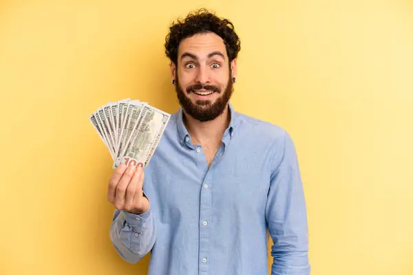 Young Man Looking Happy Pleasantly Surprised Dollar Banknotes Concept — Stock Photo, Image
