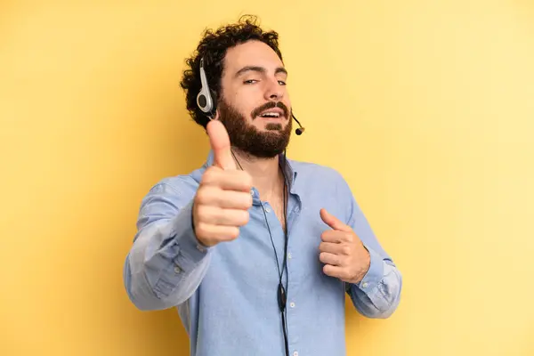 Young Man Feeling Proud Smiling Positively Thumbs Telemarketer Concept — Stock Photo, Image