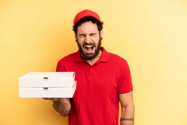 Young Man Shouting Aggressively Looking Very Angry Pizza Delivery Concept — Stock Photo, Image