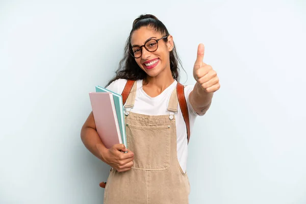 Hispanic Woman Feeling Proud Smiling Positively Thumbs University Student Concept — Zdjęcie stockowe