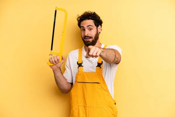 Young Man Pointing Camera Choosing You Handyman Saw — Stock Photo, Image