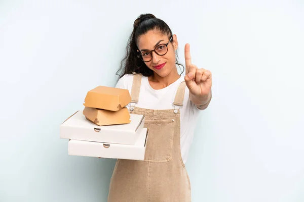 Hispanic Woman Smiling Looking Friendly Showing Number One Fast Food — Stockfoto