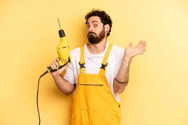 Young Man Feeling Puzzled Confused Doubting Handyman Drill — Stock Photo, Image