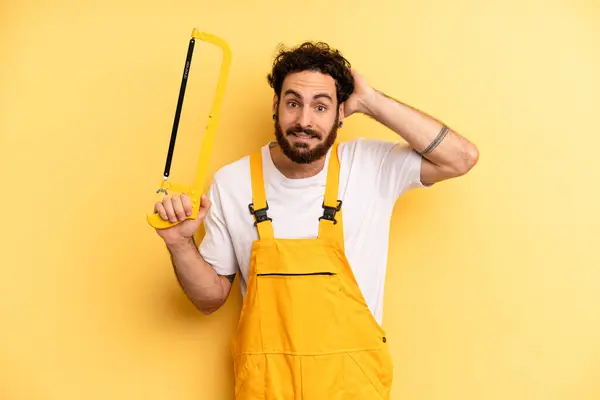 Young Man Feeling Stressed Anxious Scared Hands Head Handyman Saw — Stock Photo, Image
