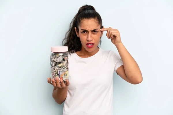 Hispanic Woman Feeling Confused Puzzled Showing You Insane Savings Concept — Stockfoto