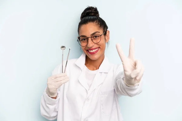 Hispanic Woman Smiling Looking Happy Gesturing Victory Peace Dentist Concept — Zdjęcie stockowe