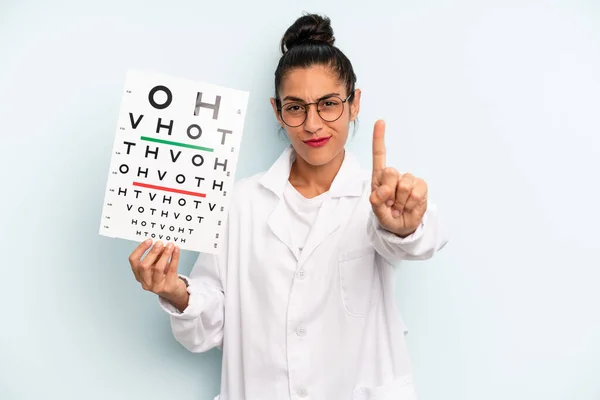 Hispanic Woman Smiling Proudly Confidently Making Number One Optical Vision — Stok fotoğraf