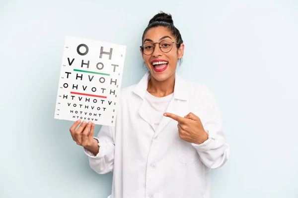 Hispanic Woman Looking Excited Surprised Pointing Side Optical Vision Test — Fotografia de Stock