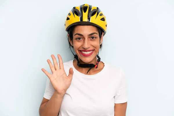 Hispanic Woman Smiling Happily Waving Hand Welcoming Greeting You Bike — Zdjęcie stockowe