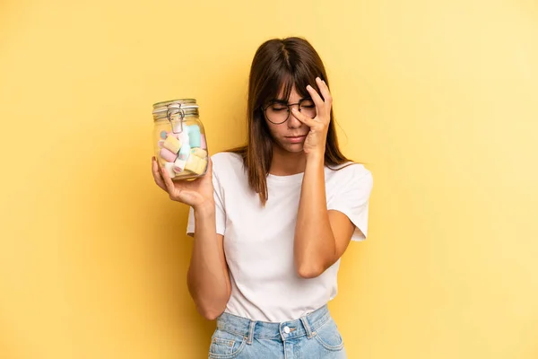 Hispanic Woman Feeling Bored Frustrated Sleepy Tiresome Candies Bottle Concept — Stockfoto