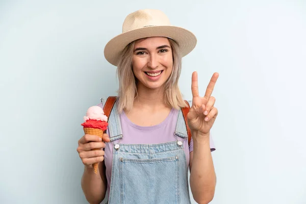 Blonde Woman Smiling Looking Friendly Showing Number Two Ice Cream — Stockfoto