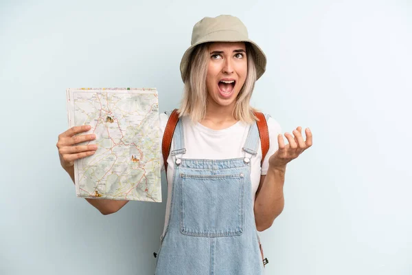 Blonde Woman Looking Desperate Frustrated Stressed Tourist Map Concept — Zdjęcie stockowe