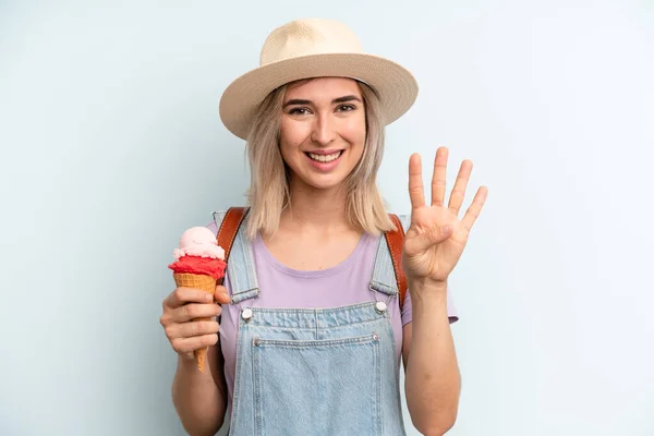Blonde Woman Smiling Looking Friendly Showing Number Four Ice Cream — Fotografia de Stock