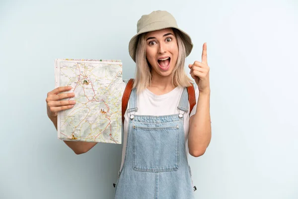 Blonde Woman Feeling Happy Excited Genius Realizing Idea Tourist Map — Zdjęcie stockowe