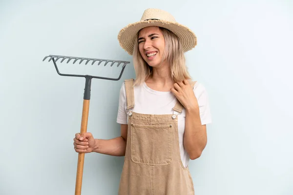 Blonde Woman Feeling Stressed Anxious Tired Frustrated Farmer Rake Cocnept — Foto Stock