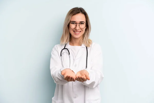 Blonde Woman Smiling Happily Friendly Offering Showing Concept Medicine Student — Stockfoto