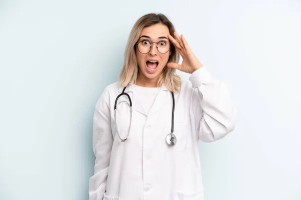 Blonde Woman Looking Happy Astonished Surprised Medicine Student Concept — Zdjęcie stockowe