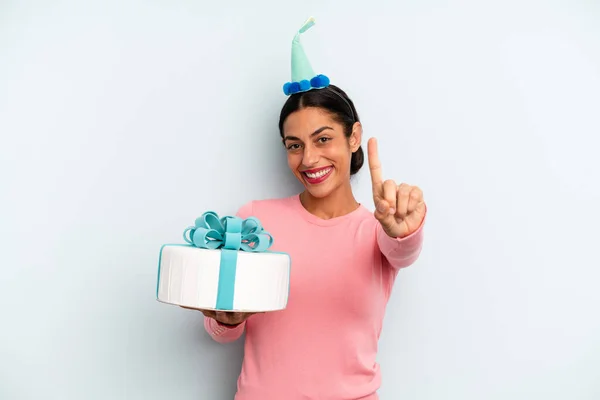 Hispanic Woman Smiling Proudly Confidently Making Number One Birthday Cake — Foto de Stock