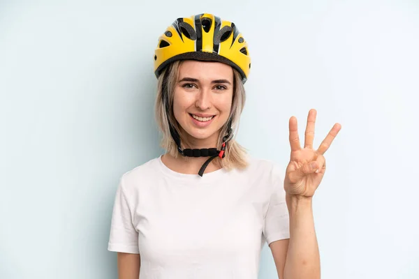 Blonde Woman Smiling Looking Friendly Showing Number Three Bike Sport — Stock Fotó