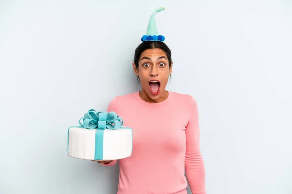 Hispanic Woman Looking Very Shocked Surprised Birthday Cake Concept — Stockfoto