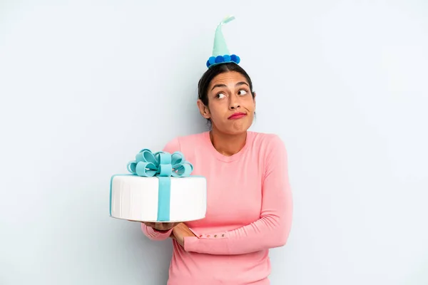 Hispanic Woman Shrugging Feeling Confused Uncertain Birthday Cake Concept — Stock fotografie