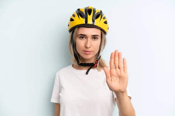 Blonde Woman Looking Serious Showing Open Palm Making Stop Gesture — 스톡 사진