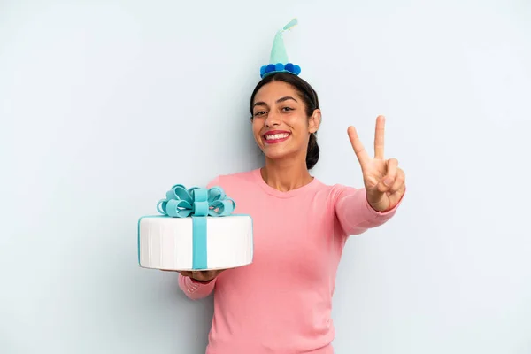 Hispanic Woman Smiling Looking Friendly Showing Number Two Birthday Cake — Stockfoto