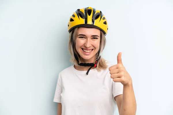 Blonde Woman Feeling Proud Smiling Positively Thumbs Bike Sport Concept — Zdjęcie stockowe