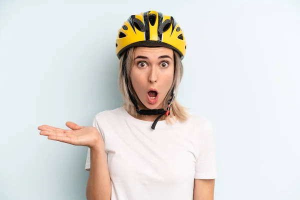 Blonde Woman Looking Surprised Shocked Jaw Dropped Holding Object Bike — Foto de Stock