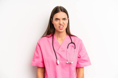 Güzel kadın şaşkın ve şaşkın hissediyor. hemşire konsepti