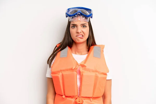 Pretty Girl Looking Puzzled Confused Life Jacket Summer Concept — Stock Photo, Image