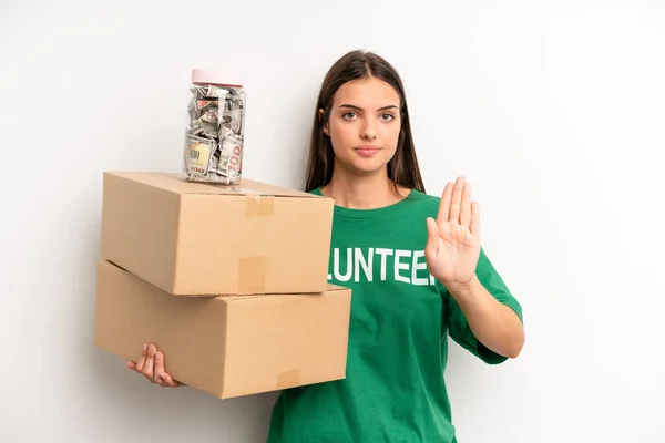 Pretty Woman Looking Serious Showing Open Palm Making Stop Gesture — Stockfoto