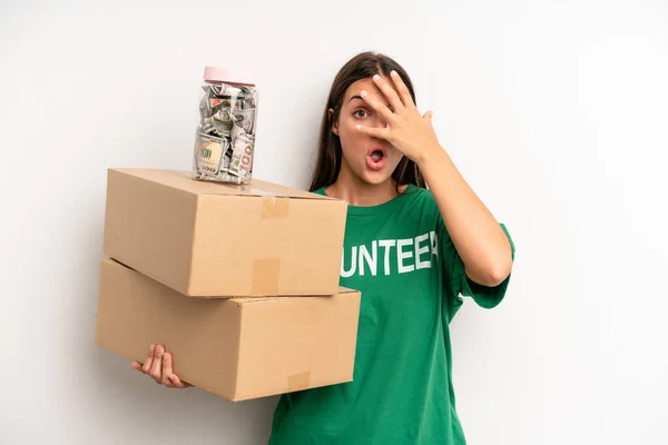 Pretty Woman Looking Shocked Scared Terrified Covering Face Hand Volunteer — Foto de Stock