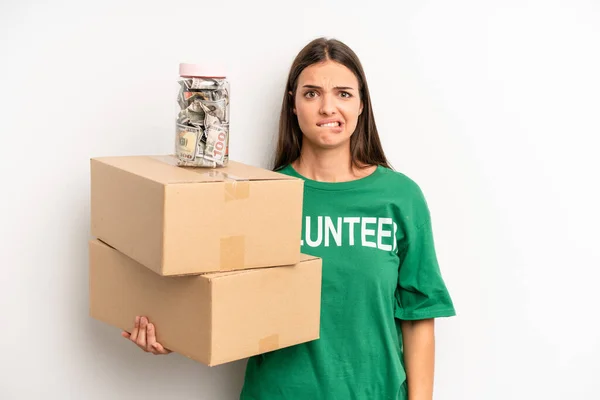 Pretty Woman Looking Puzzled Confused Volunteer Donation Concept — Stok fotoğraf
