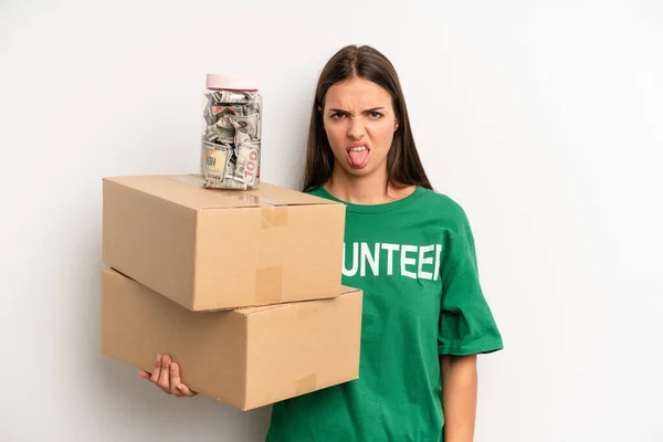 Pretty Woman Feeling Disgusted Irritated Tongue Out Volunteer Donation Concept — Stock Photo, Image