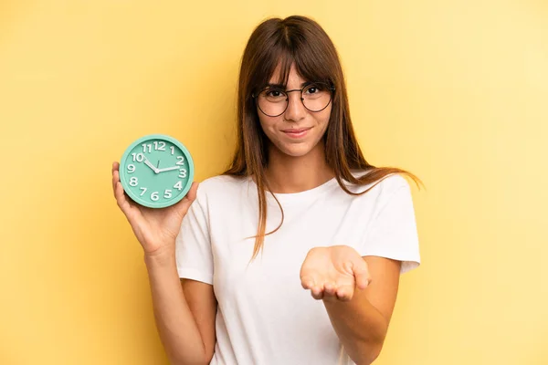 Hispanic Woman Smiling Happily Friendly Offering Showing Concept Alarm Clock — Fotografia de Stock