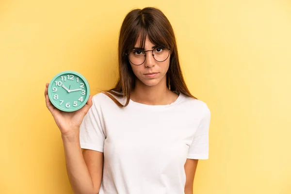 Hispanic Woman Feeling Sad Upset Angry Looking Side Alarm Clock — Stockfoto