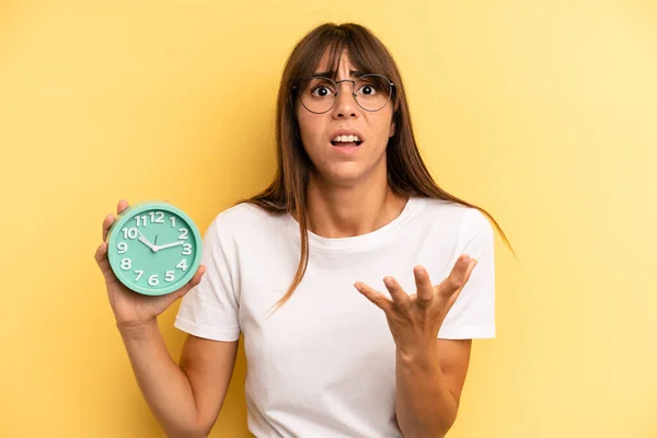 Hispanic Woman Looking Desperate Frustrated Stressed Alarm Clock Concept — Foto de Stock