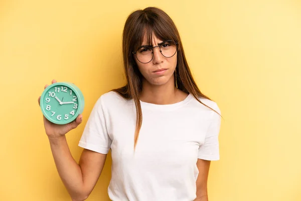 Hispanic Woman Feeling Puzzled Confused Alarm Clock Concept — Stockfoto