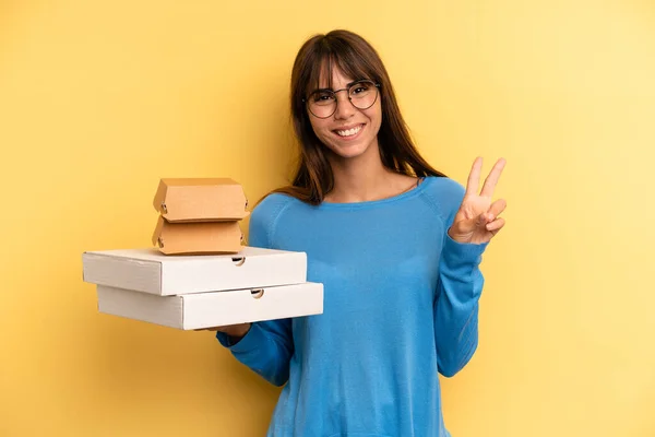 Pretty Woman Smiling Looking Friendly Showing Number Two Take Away — Fotografia de Stock