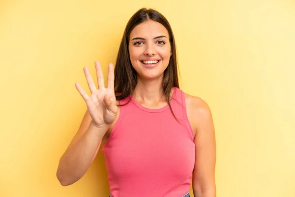 Young Adult Pretty Woman Smiling Looking Friendly Showing Number Four — Stock Photo, Image
