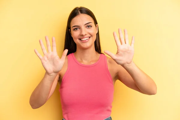 Young Adult Pretty Woman Smiling Looking Friendly Showing Number Ten — Stockfoto